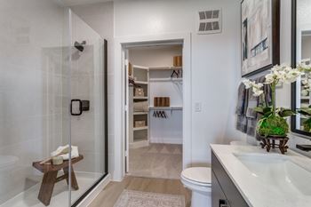Custom-tiled showers with glass doors*